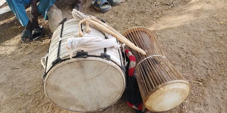 UBIDS Lecturer, Prof. Tony Tampah Donates Traditional Instruments to Kandomwine Bawaa Group